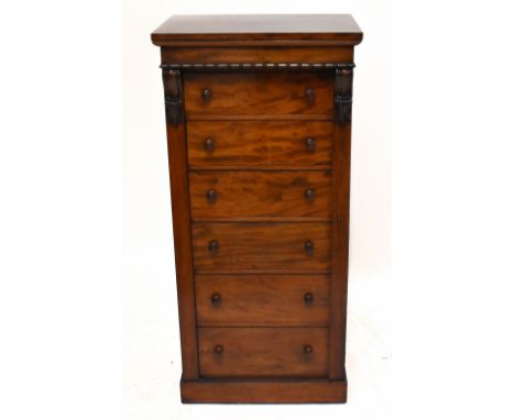 A Victorian mahogany Wellington chest, with six drawers, on plinth base, height 124cm, width 58cm, depth 42cm. With key.&nbsp