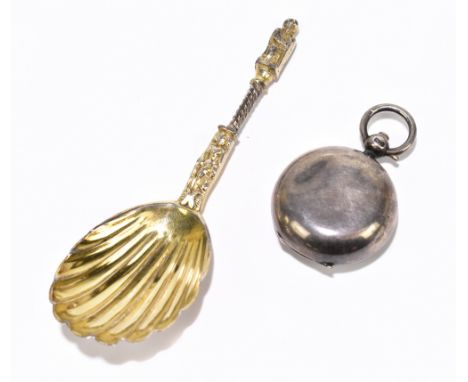 A Victorian hallmarked silver caddy spoon, with apostle terminal and shell shaped bowl, London 1870, with a hallmarked silver
