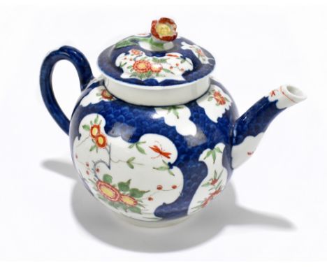 WORCESTER; an 18th century bullet shaped teapot decorated in the 'Kakiemon' pattern with blue scales, with underglazed blue f