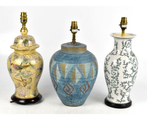 ROCHAMP LTD, a contemporary stoneware lamp, height 39cm and two Oriental inspired lamps (3).