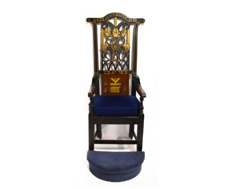 MASONIC INTEREST; a large mid-19th century painted stained wood elbow chair 'The Junior Warden's Chair', the shaped top rail 