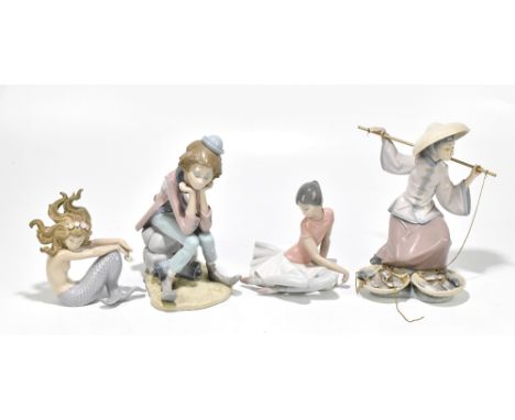 LLADRO; four figures including a seated mermaid, height 15cm, a fish seller, a seated clown, etc (4).Additional InformationTh