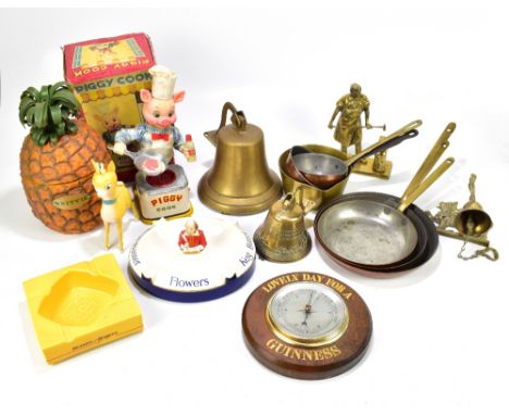 A selection of assorted metalware including copper pans, also a battery operated Piggy figure, a Guinness barometer, etc.