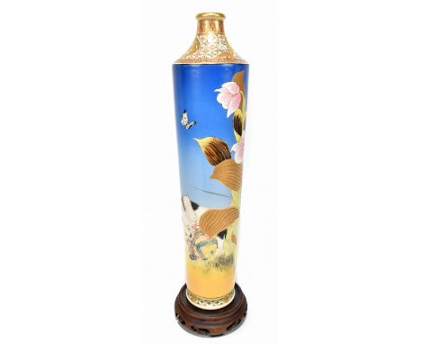 A large Japanese Satsuma Meiji period cylindrical vase, the main panel decorated with a kitten playing with a ball of string 