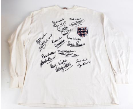 ENGLAND; a 1966 retro-style football shirt, signed by Peters, Hurst, J. Charlton, Wilson, Stiles, Hunt, Banks, Cohen, Greaves