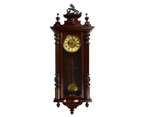 A reproduction Vienna style wall clock with Roman numerals to the painted dial, height approx 120cm.Additional InformationDam
