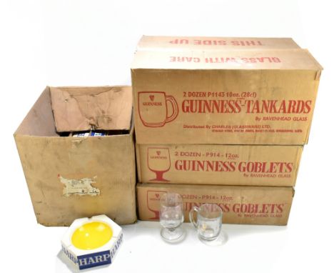 GUINNESS; a large collection of assorted advertising glasses (boxed), also eight Harp advertising ashtrays.