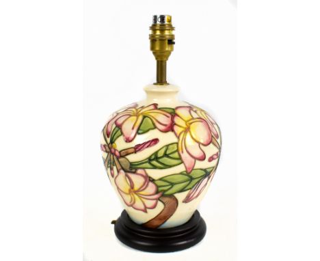 MOORCROFT; a modern cream ground floral decorated table lamp, height including fitment 30cm.Additional InformationLamp appear