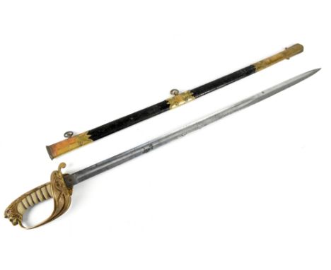 A Victorian 1827 pattern naval officer's sword, the 74cm blade with acid etched detailing named for Whiteman Outfitter Woolwi