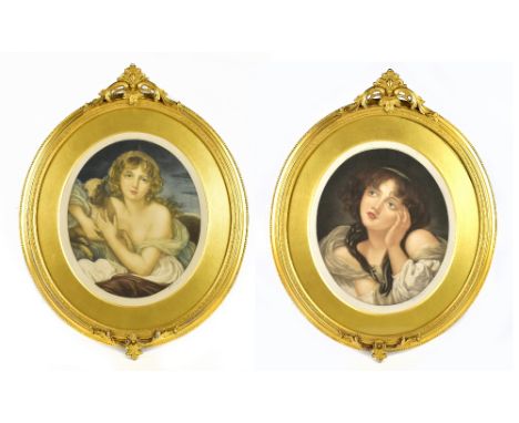 A pair of early 20th century pencil signed prints depicting Art Nouveau style maidens, one cradling a lamb, published circa 1