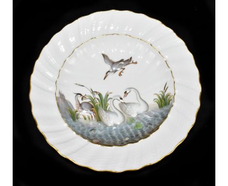 MEISSEN; an early 20th century hand painted and relief moulded plate decorated in the 'Swan' pattern, blue painted cross swor