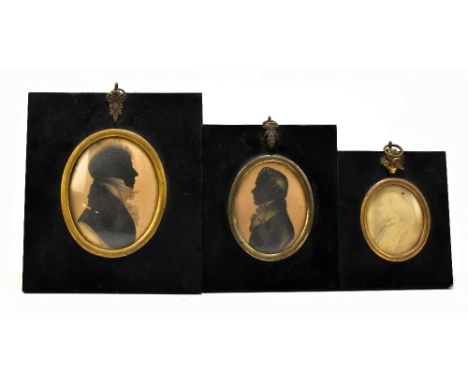 A Regency silhouette of a gentleman with a lace trim collar, indistinctly named verso possibly for Alexander Willis(?), with 