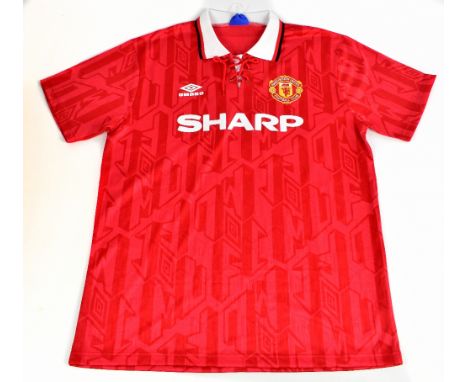 ERIC CANTONA; a Manchester United 96/98 home shirt, signed to the reverse, size XL.Additional InformationCreasing and light g
