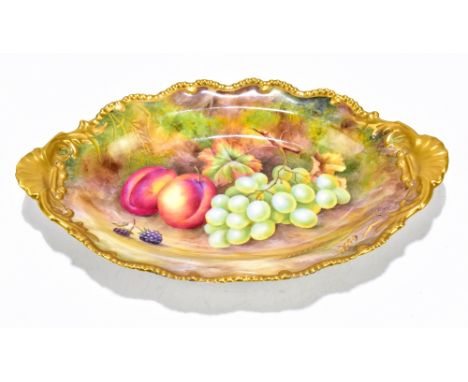 HORACE PRICE FOR ROYAL WORCESTER; a hand painted oval bowl, decorated with fruit inside and gilt scrolling detail, manufactur