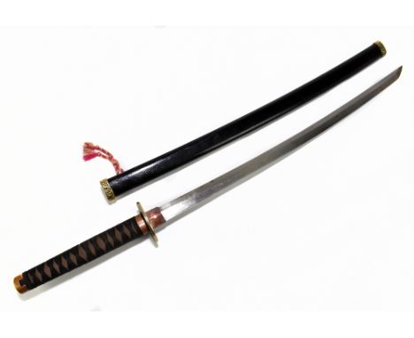 A Japanese Katana with gilt heighted Tsuba decorated with two birds amongst branches, with braid approx 63cm and with ebonise