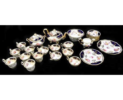 A 19th century twenty-seven piece part dinner service, possibly by H &amp; R Daniel, with hand painted floral decoration insi