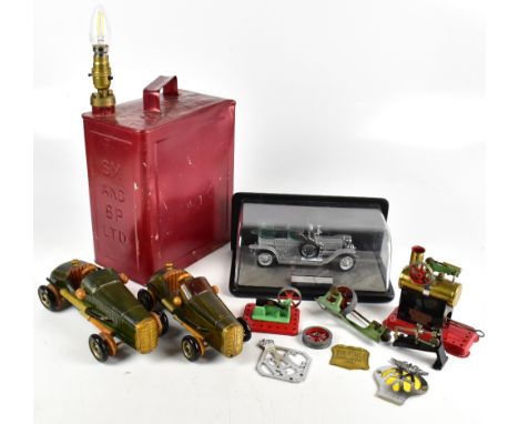 A cased model of a 1907 Rolls Royce Silver Ghost, two wooden models of motor vehicles, two Mamod engines, various car badges 