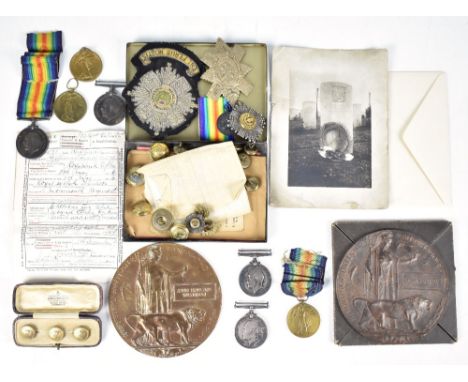 A WWI medal and memorial plaque group comprising British War Medal and Victory Medal awarded to 203317 Pte. E. Hall, Manchest