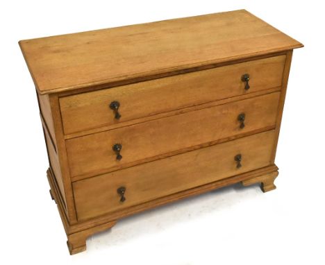 A 1920s light oak three drawer chest, on ogee bracket feet, height 77.5cm, width 106cm, depth 46cm.Additional InformationThe 