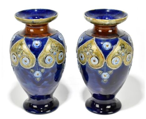 ROYAL DOULTON; a pair of Artware vases, relief decorated with Arts and Crafts-style decoration, impressed marks to the unders