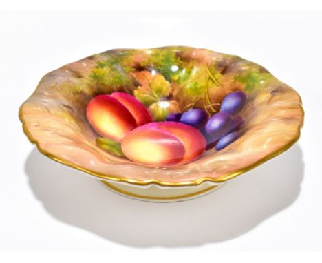MOSELEY FOR ROYAL WORCESTER; a hand painted pedestal bowl with wavy rim, painted with fruit, factory mark to the underside, d