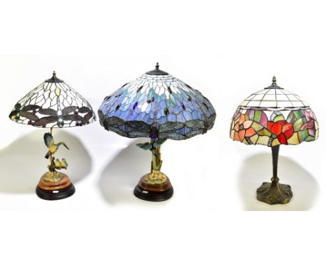 Three contemporary table lamps, each with Tiffany style shade (one lamp af).