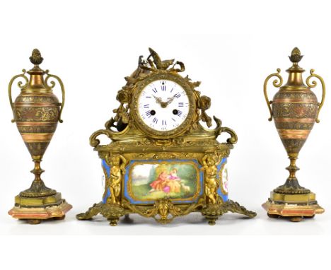 A 19th century French Sèvres mounted ormolu eight day mantel clock, the enamelled dial set with Roman numerals and movement s