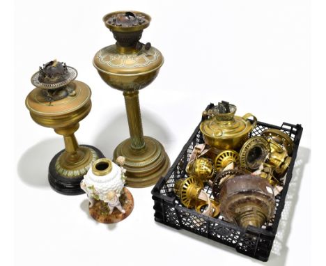 A collection of assorted lighting including two brass oil lamps, height of largest example 37cm, together with assorted oil l