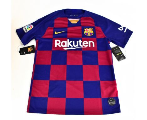 LIONEL MESSI; a Barcelona Nike home football shirt, signed to the reverse, size M.&nbsp;Additional InformationCreasing and li