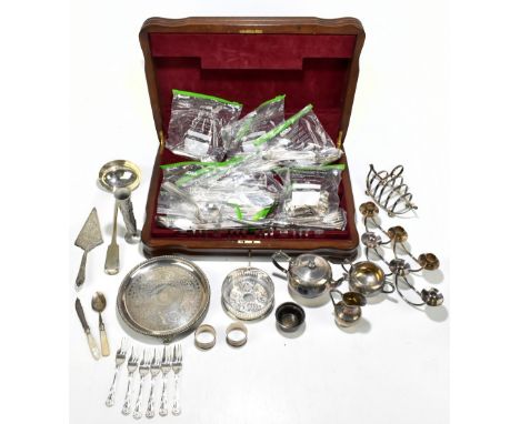 A group of assorted silver plate including a mahogany cased part canteen of Community plate, a toast rack, a three piece tea 