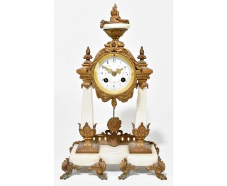 A late 19th century gilt spelter and white marble eight day mantel clock with Arabic numerals to the painted dial flanked by 