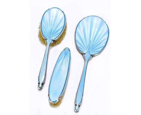 ADIE BROS; a George VI hallmarked silver and guilloche enamel three piece dressing table set, comprising hand mirror, hair br