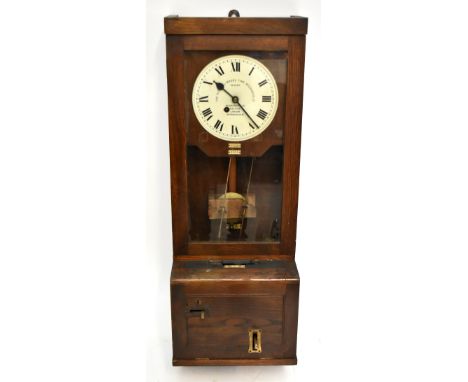 The Gledhill-Brook Time Recorders Ltd oak cased clocking-in clock.&nbsp;Additional InformationThere is a key for the mechanis