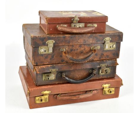 Four vintage travelling cases.