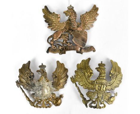 Two Imperial Prussian Pickelhaube badges, one with initials for 'FR', the other with an overlaid armorial badge, with a furth