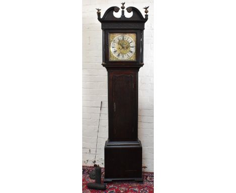 A George III oak eight day longcase clock, with square brass dial inscribed 'John Stancliffe', with arched door to plinth bas