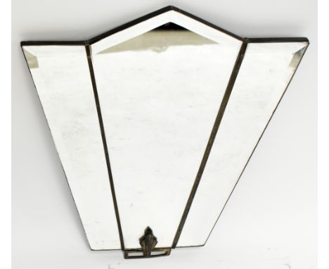 An Art Deco clear glass wall mirror with bevelled edged plate, with silvered metal applied mount and decoration to the lower 