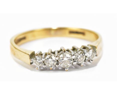 A 9ct yellow gold five stone dress ring set with five diamonds, size K, approx weight 1.7g.Additional InformationScratches, s