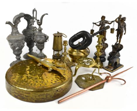 A quantity of metalware including spelter vases, press, reproduction sundial, modern miner's lamp, etc.