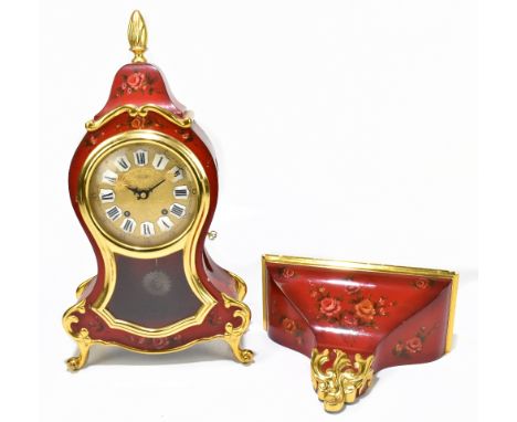ZENITH; a decorative modern Italian style bracket clock, with gilded detail and red lacquered body, the circular dial with bo
