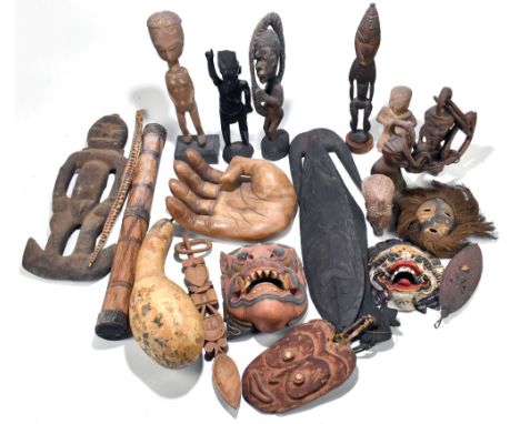 A quantity of tribal carving including figures, also Thai mask, etc.PROVENANCE: from the Brian Morley collection. Brian Morle