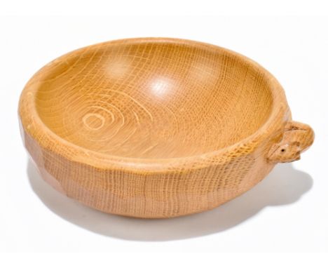 WORKSHOP OF ROBERT 'MOUSEMAN' THOMPSON; an adzed oak nut bowl with signature mouse, diameter approx 16cm.Additional Informati