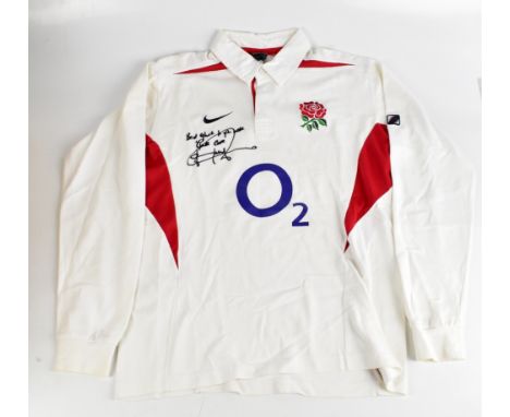 JOHNNY WILKINSON; a 2003 England rugby shirt, signed to the front.Additional InformationCreasing and light general, no certif