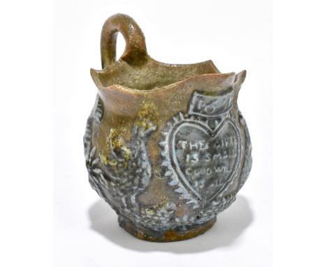 CASTLE HEDINGHAM; an art pottery jug in 17th century style, with faux date of 1651 and inscribed 'The Gift is Small, Goodwill