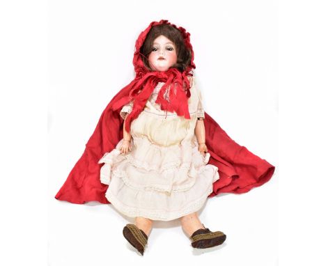 A late 19th century German bisque headed doll with sleeping eyes, and articulated celluloid limbs.Additional InformationEyes 