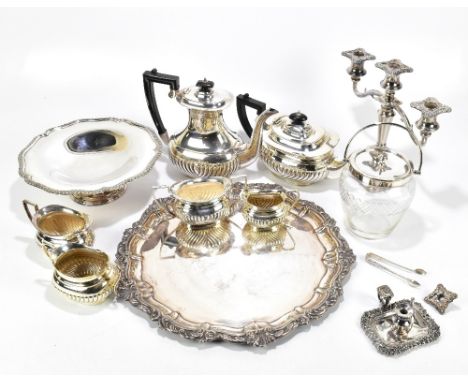 A mixed lot of assorted silver plate including a three branch candelabra, a salver, tea service, etc.