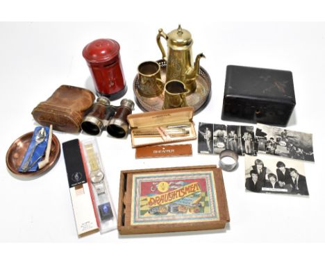 A collection of collectors' items to include two Beatles postcards and a Rolling Stone postcard, a Bank of England pillar box