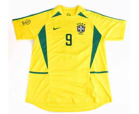 RONALDO; a 2002 Brazil football shirt, signed to the reverse, size XL.Additional InformationCreasing and light general, no ce