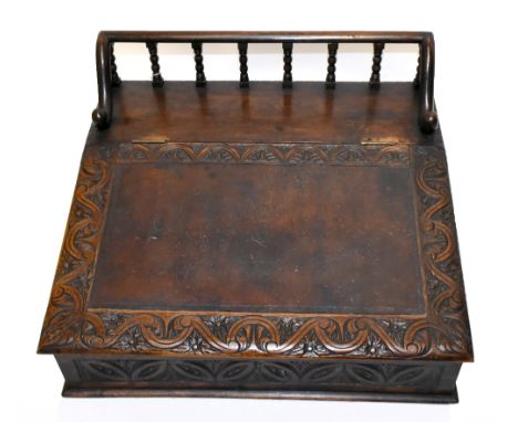 An 18th century and later carved oak bible box, with three quarter gallery and leather skiver, height 32cm, width 63cm, depth