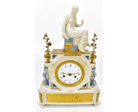 A 19th century French jasperware mantel clock with inlaid and applied gilt metal detail, the finial with a maiden seated on a